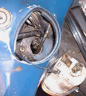 Vespa Primavera speedo removed to show cable outer